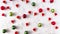 Stop motion animation of advent calender numbers on red hearts beetwen decorative snowflakes and christmas balls of red and green