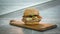 Stop motion animation of burger cooking, rotating of ready burger, 4k