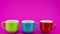Stop motion animation of colorful coffee cup on colorful background A lot of cups for coffee and tea in coffee shop Video footage