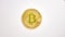 Stop motion animation Dollar cash money bills moving in and out with Bitcoin Crypto placed in the middle on white background. Mone