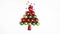 Stop motion animation flat lay top view creative christmas tree of red and green evening balls and stars that are going to the