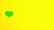 Stop motion animation of green paper hearts and clover on yellow background Saint Patrick\'s Day 17 march