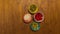 Stop motion of bowls of vegetables, fish and meat viewed from above