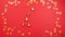 Stop motion christmas tree made of ball decoration on red background. Concept holiday atmosphere, new year, celebration, videocard