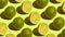 Stop Motion Cut and whole green limes alternating diagonally on a green background