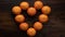 Stop motion heart shaped tangerines.Animation of a beating heart.