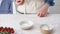 Stop motion, woman prepare Italian pizza with sauce, tomatoes, seasonings, greens, cheese mozzarella. Dough for bread