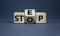 Stop or next step symbol. Turned cubes and changed the word `stop` to `step`. Beautiful grey background, copy space. Business,