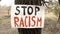 Stop Racism - Banner on wood - Text banner