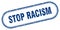 Stop racism stamp. rounded grunge textured sign. Label