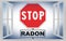 Stop radon - Concept image with road sign on white background seen through a window