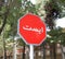 Stop road sign in Persian Farsi language