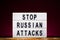 Stop Russian Attacks words on lightbox. Resist to russian aggression illustration