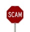 Stop Scam red road sign