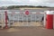 Stop sign barrier to prevent people, cars or ehicles from entering a river from a wharf or quayside