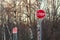 Stop sign and detour on the side of an asphalt road