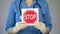 Stop sign in female physician hands, doctor warning about diseases, health care