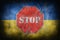 Stop sign over the flag of Ukraine. Stop war. Restricted are, war zone. Grunge look with cracks and scratches illustration