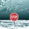 Stop sign In storm at sea