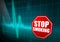 STOP SMOKING sign on turquoise heart rate monitor