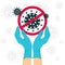 The stop symbol of the coronavirus. Hands close-up. In medical surgical gloves.