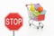 Stop traffic sign and shopping cart
