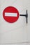 Stop traffic sign. White brick in red round roadsign