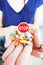 Stop using drugs or antidepressants concept with miniature stop road sign and colorful pills in woman hand