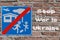 Stop War in Ukraine written on a brick wall with no bombing sign. Third world war concept