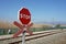 Stop warning sign on the rails in the station