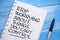 Stop worrying about things you cant control, text words typography written on paper against wooden background, life and business