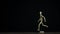 Stopmotion running wooden figure dummy rotates in studio on black background for titles