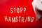 Stopp hamstring norwegian word toilet paper text wooden letter on red background coronavirus covid-19