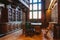 Storage of books. Large old library in the Gothic style. Shelves and rows with books. City Library at the City Hall of Denmark