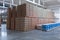 The storage and carriage at industrial food industry facility. A glass clear bottles for alcoholic or soft drinks beverages and