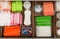 Storage of different feminine hygiene products in wooden organizers, top view