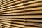 Storage of piles of wooden boards on the sawmill. Boards are stacked in a carpentry shop. Sawing drying and marketing of