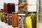 Storage shelves in pantry with homemade canned preserved fruits and vegetables