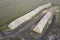 Storage straw bales in the field. Drone view