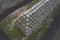 Storage straw bales in the field. Drone view