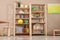 Storage for toys in colorful child`s room. Idea for interior