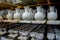 Storage of traditional handmade cups of clay in a pottery, Crete.