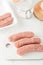 Store bought uncooked meat sausages