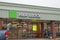 A store front H&R Block tax preparation office in a New Jersey strip mall. Offering financial advice and tax preparation