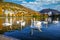 Store LungegÃ¥rdsvannet in the afternoon and the clouds sky, mountains reflecting the water along with swans and ducks swimming at