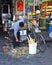 Store owner preparing sugar cane to sell in Shanghai, China 