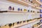 Storefront shelves of various modern sunglasses at the airport`s retail store