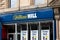 The storefront of the William Hill betting company at the streets of the Glasgow city where people can bet their money, win or