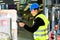 Storeman with scanner at warehouse of forwarding