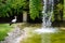 The stork near a waterfall